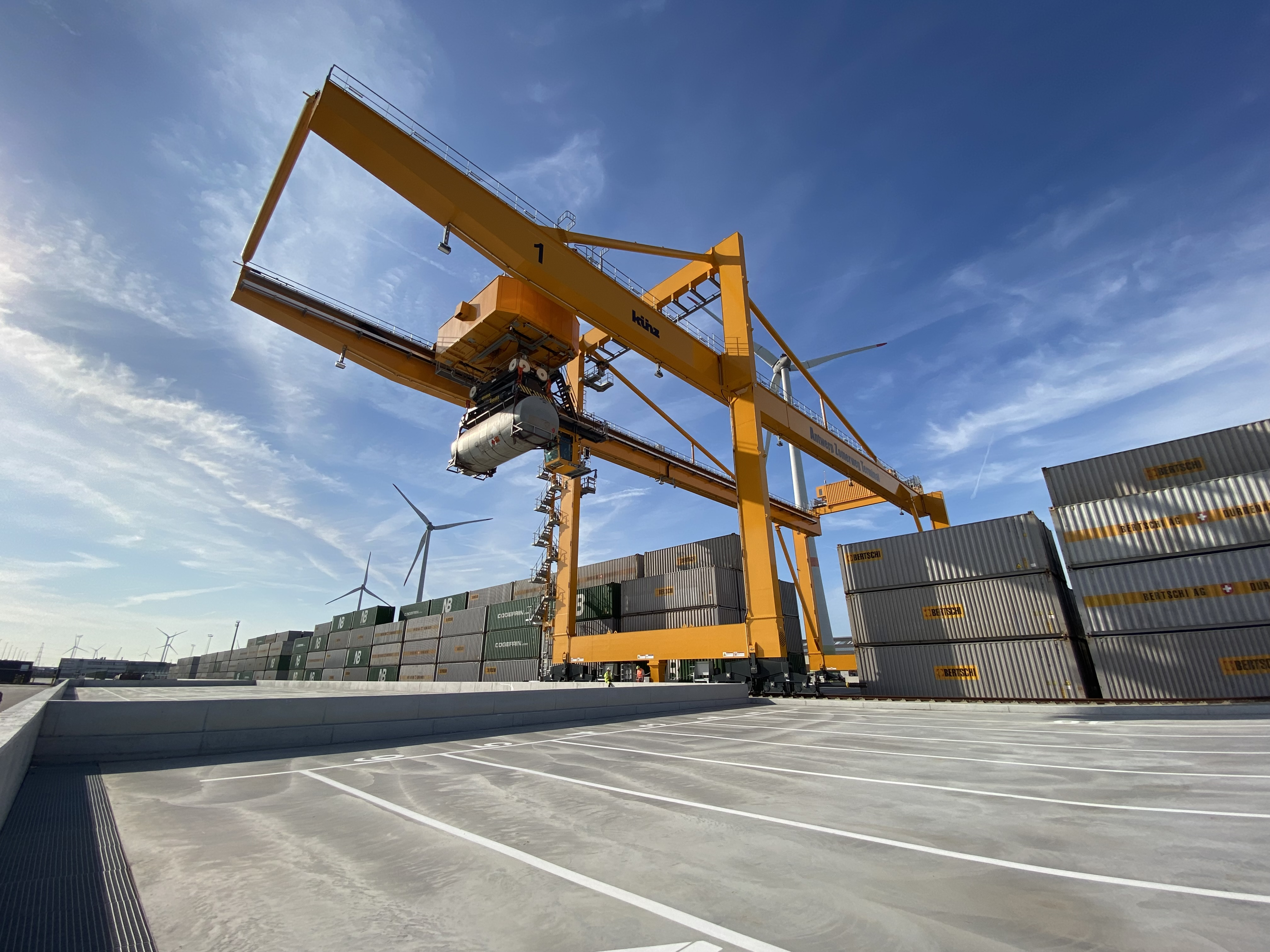 Antwerp Zomerweg Terminal gantry crane with a tank container loaded with dangerous goods