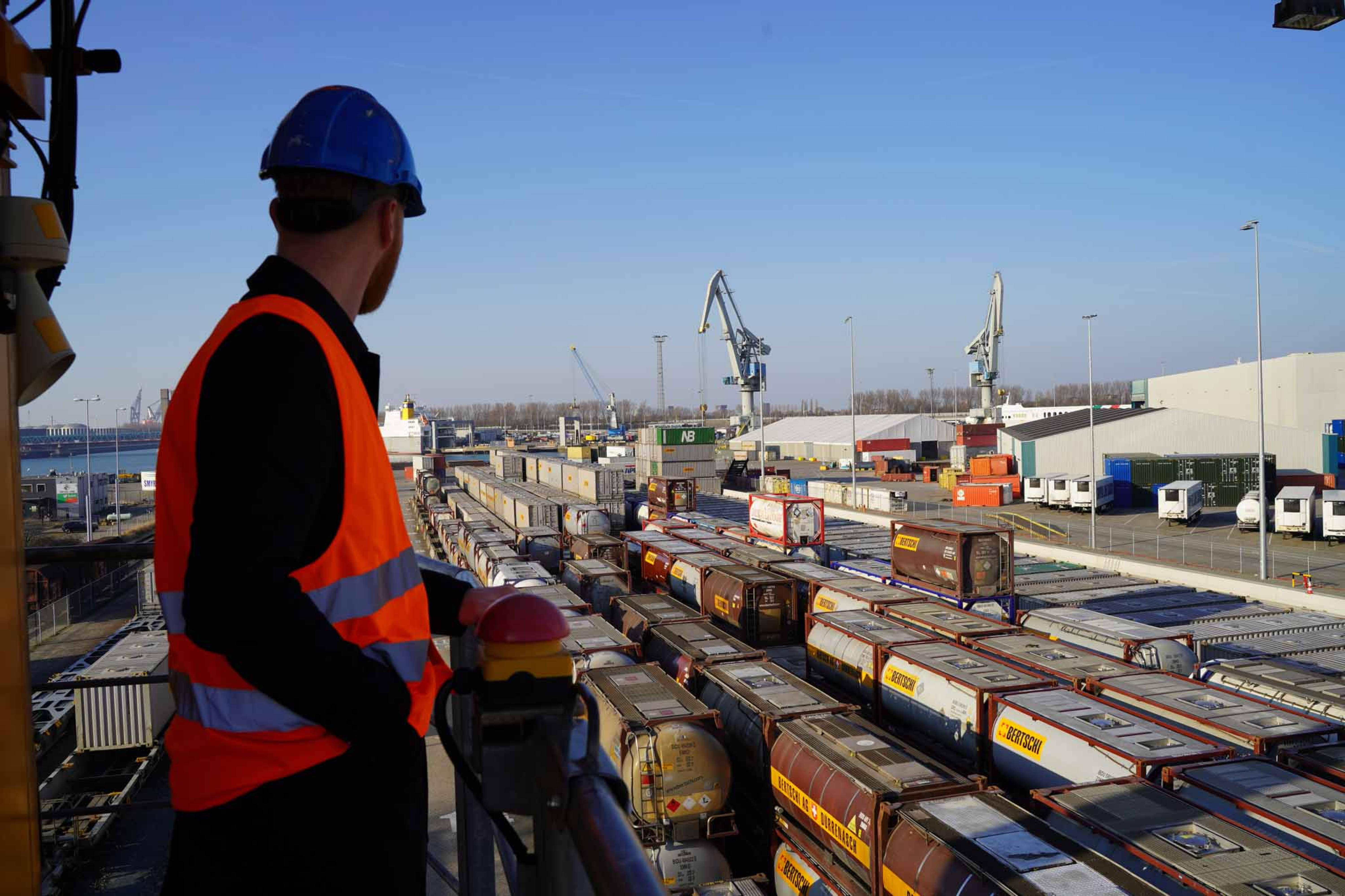Employee overlooking ADR tank container storage area at Bertschi Rotterdam in the Botlek industrial zone