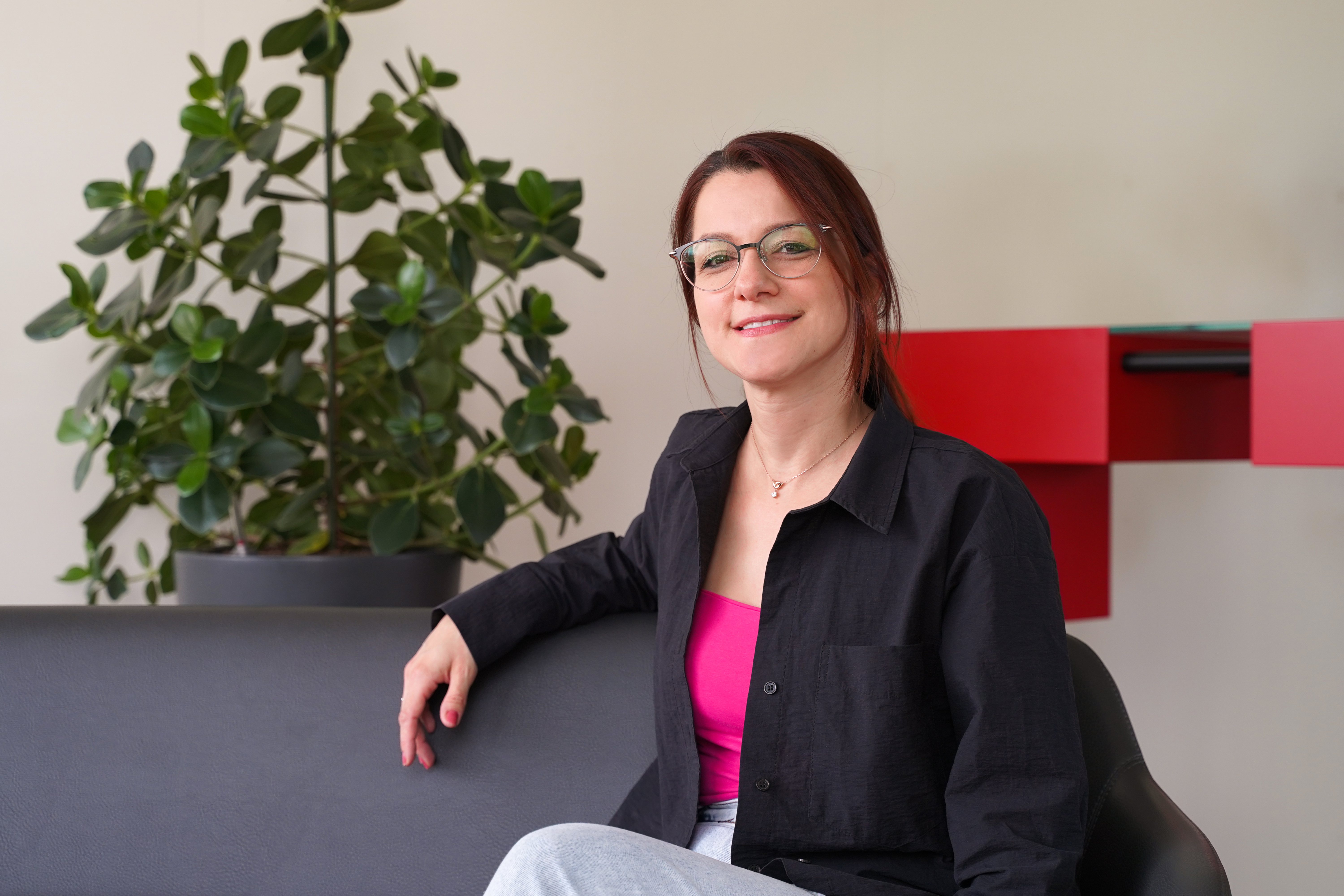 Woman sitting on chair looking confident