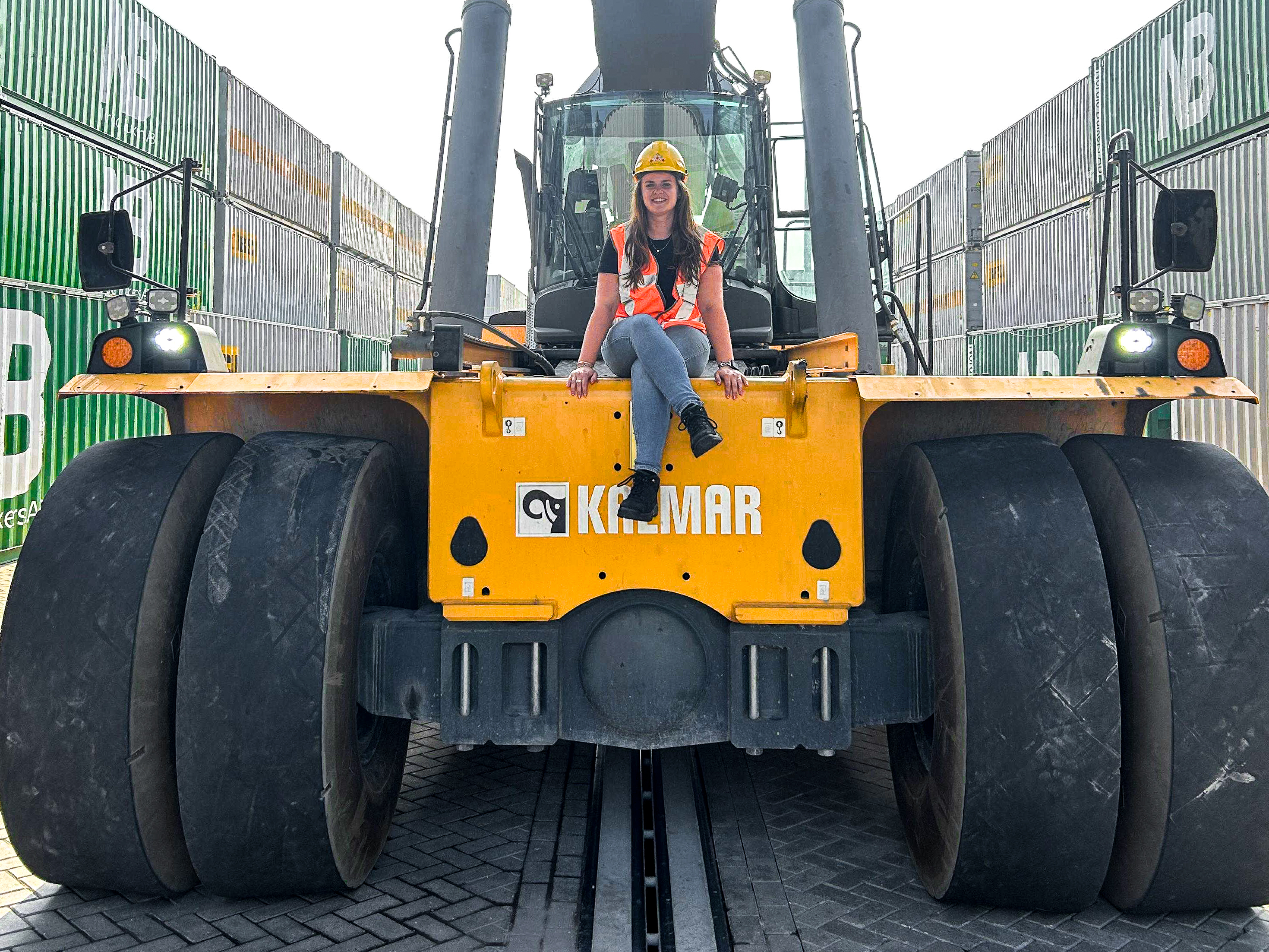 Sascha on the reach stacker female terminal worker