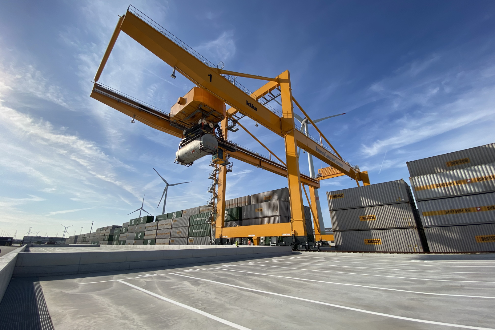 Antwerp Zomerweg Terminal gantry crane with a tank container loaded with dangerous goods
