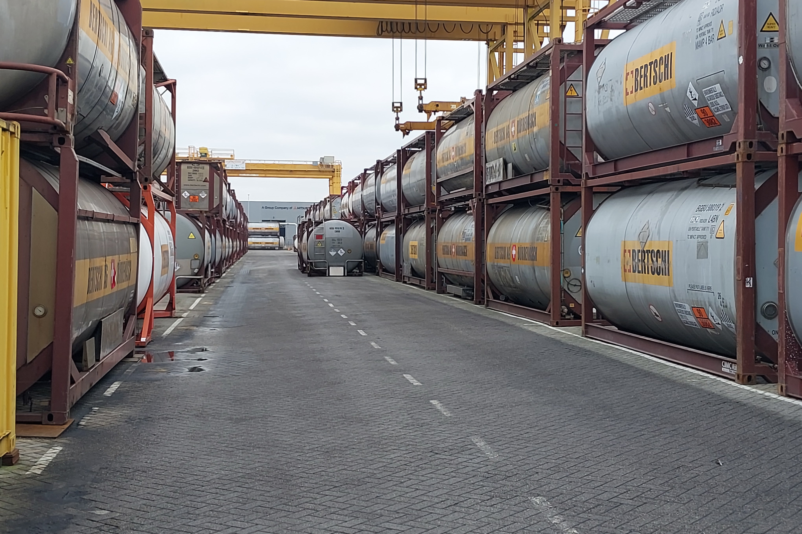 A way in the middle and left and right is a row of Containers