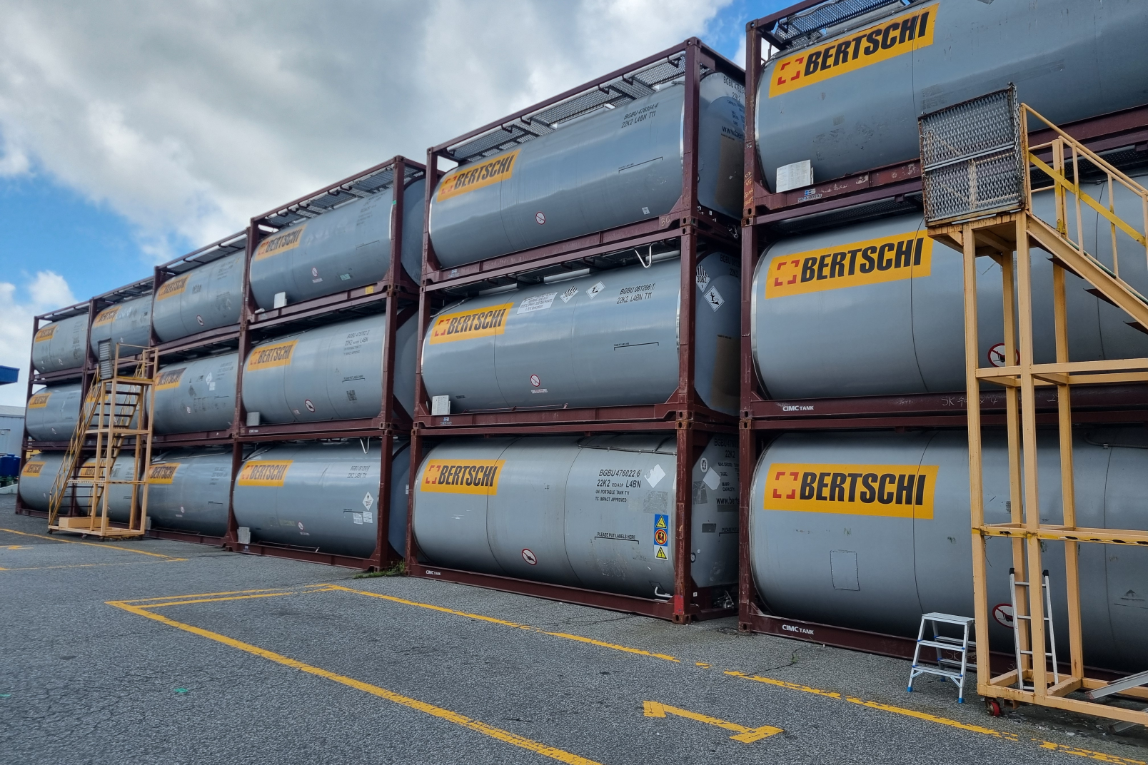 Containers stacked on top of each other in a row