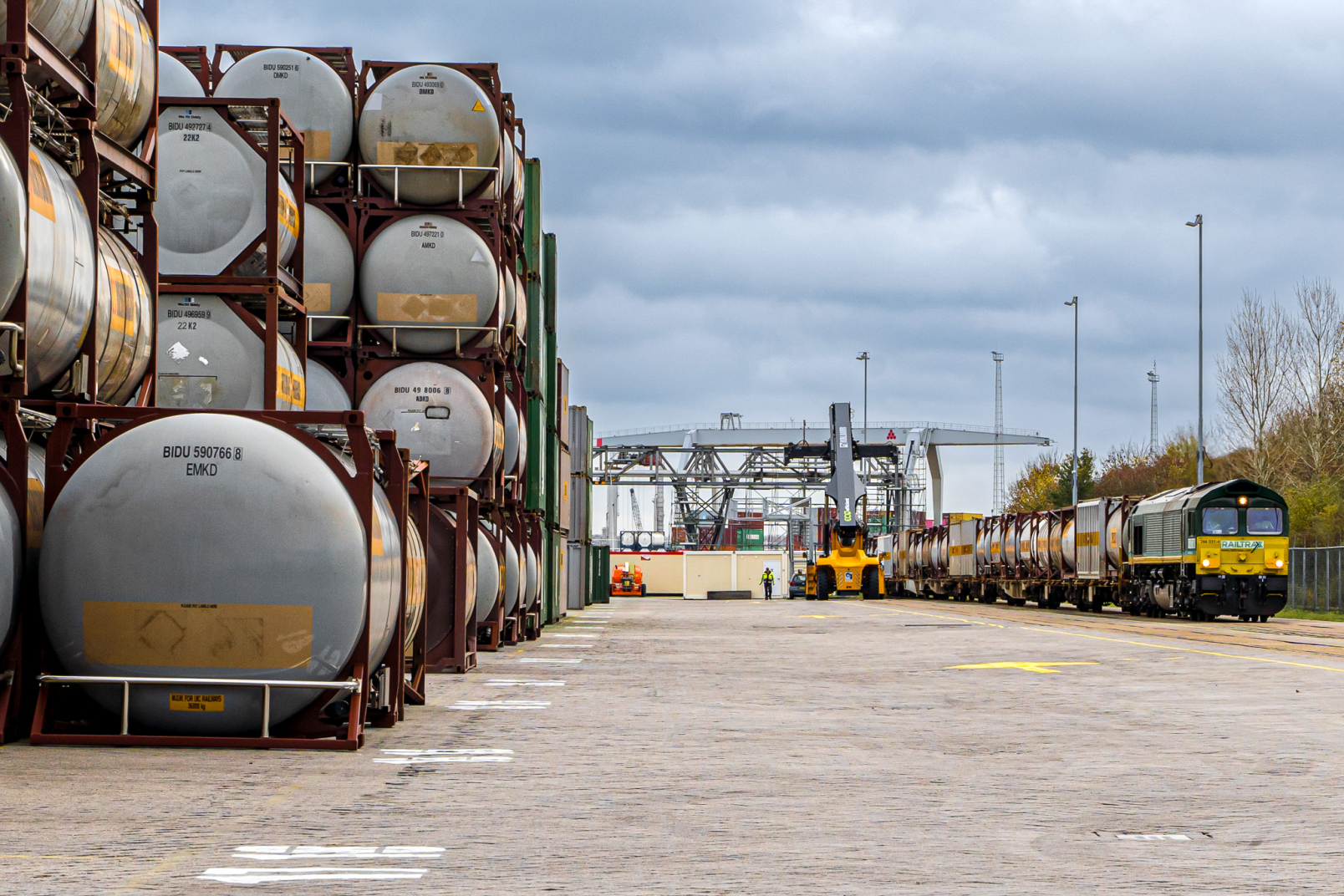 Terneuzen hub with train reachstacker container yard tank 