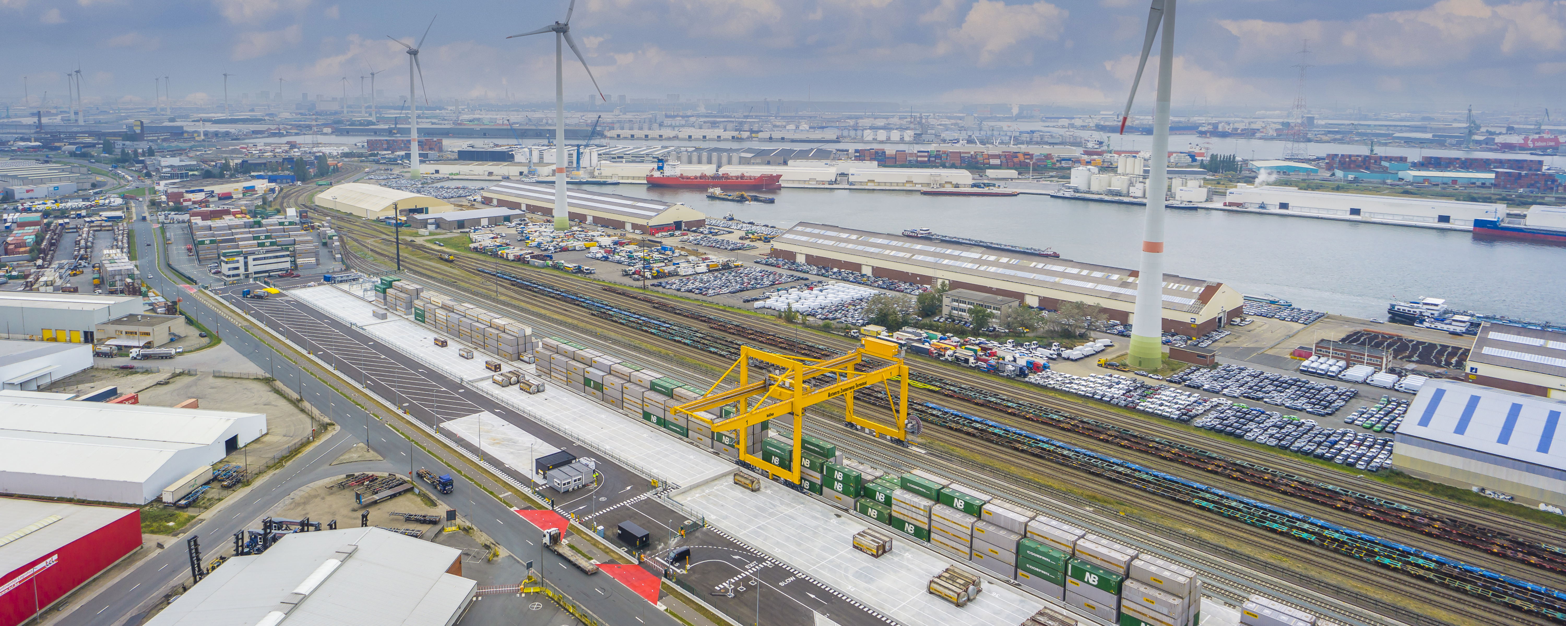 Bird’s-eye-view of the trimodal Bertschi terminal, plastics hub, and warehouse facility at the Antwerp Zomerweg port